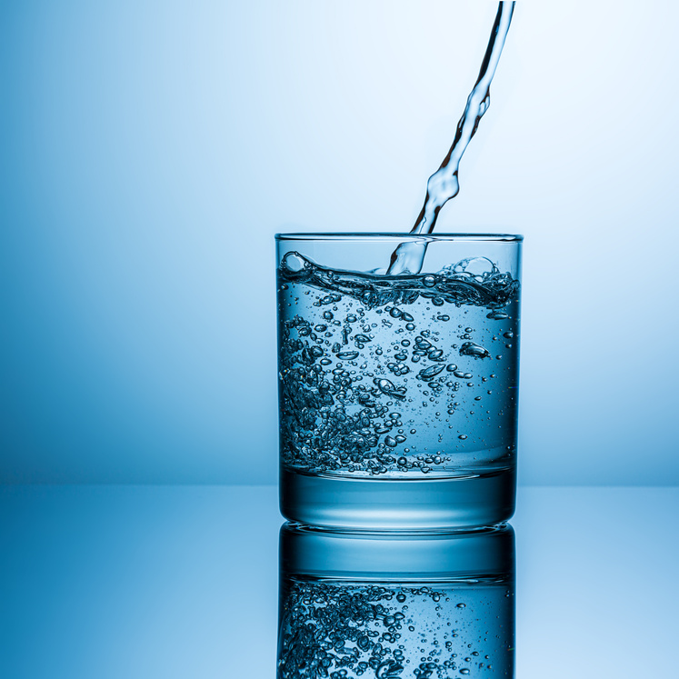 Pouring Drink Water in Glass